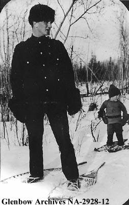 Constable Fred Moses at Lac La Biche with his son, Rod. Circa 1920. Glenbow Archives NA-2928-12